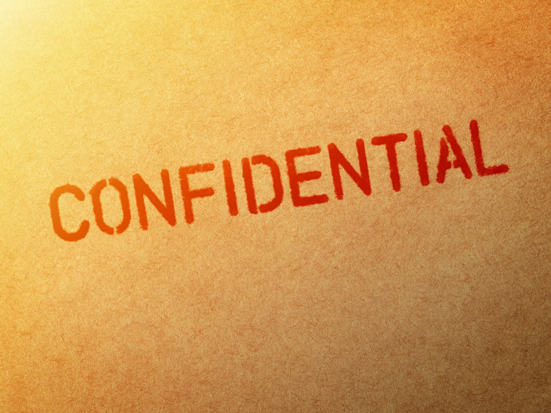 Confidential Stamp on Paper
